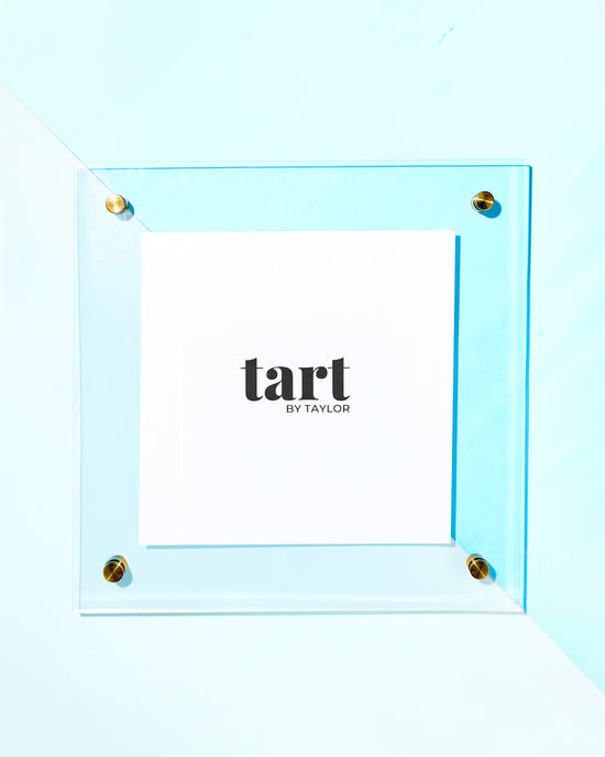 a picture frame with the word tart on it